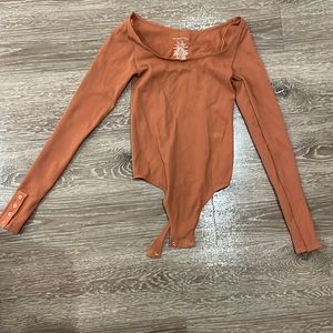 Free people orange long sleeve bodysuit M/L